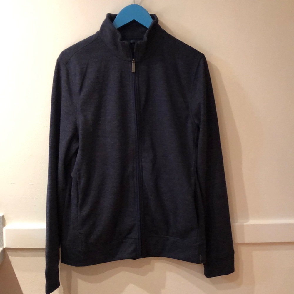 Light weight zip front jacket with side pockets.
